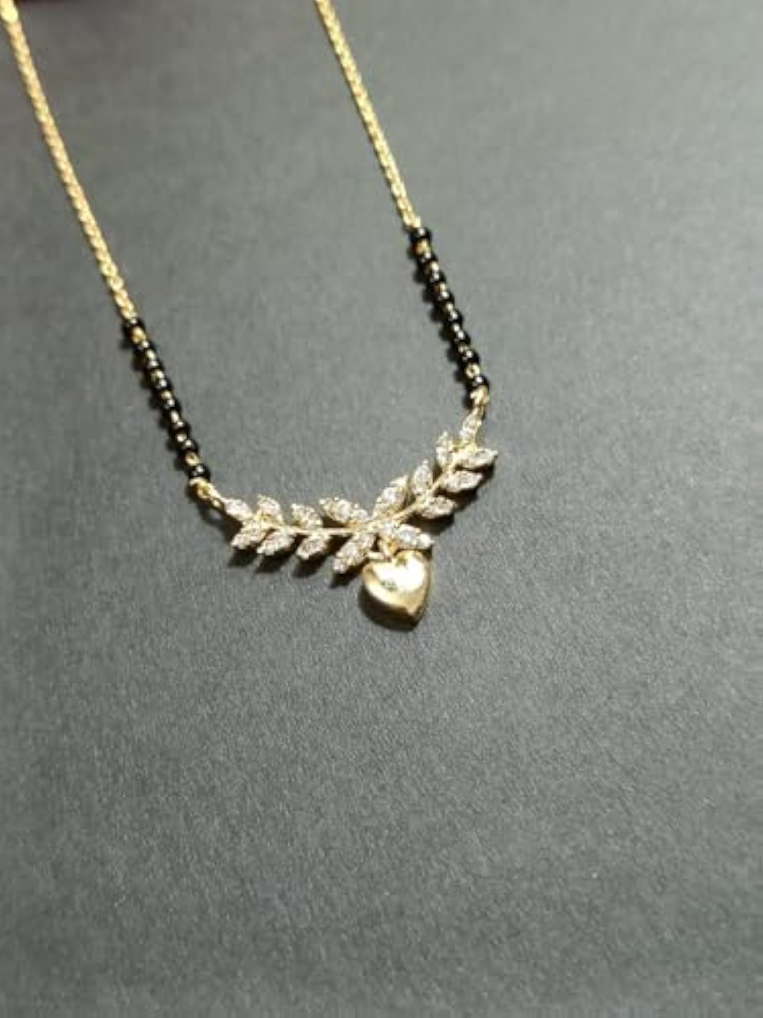 Women's Celestial Modern Black Beads Mangalsutra with CZ Leaf Pendant